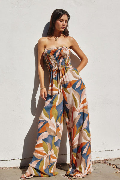 Multi Colored Leaf Print Smocked Strapless Jumpsuit
