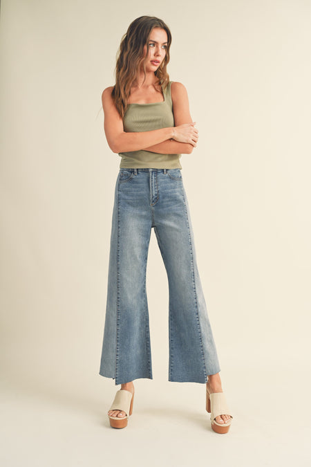 Denny Mid Rise Distressed Jeans With Slanted Cuff