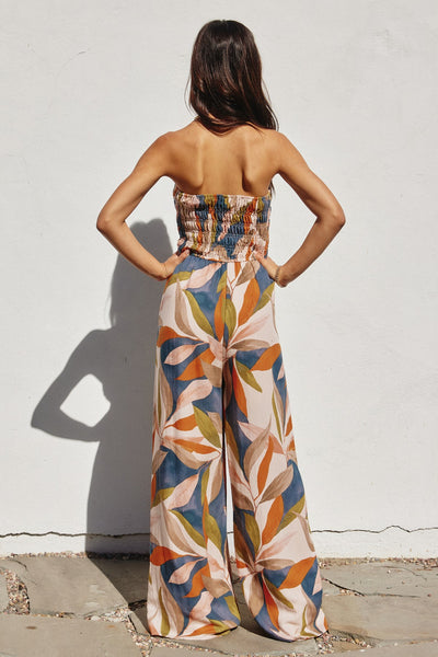 Multi Colored Leaf Print Smocked Strapless Jumpsuit