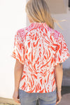 Orange Smocked Neck Printed Tassel Blouse