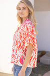 Orange Smocked Neck Printed Tassel Blouse