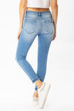 Maya Mid Rise Distressed Skinny Jeans
